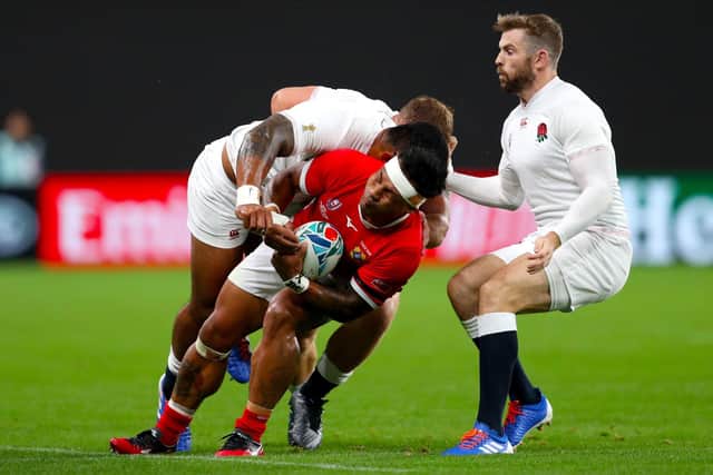 Sonatane Takulua in action for Tonga against England at the 2019 World Cup in Japan.