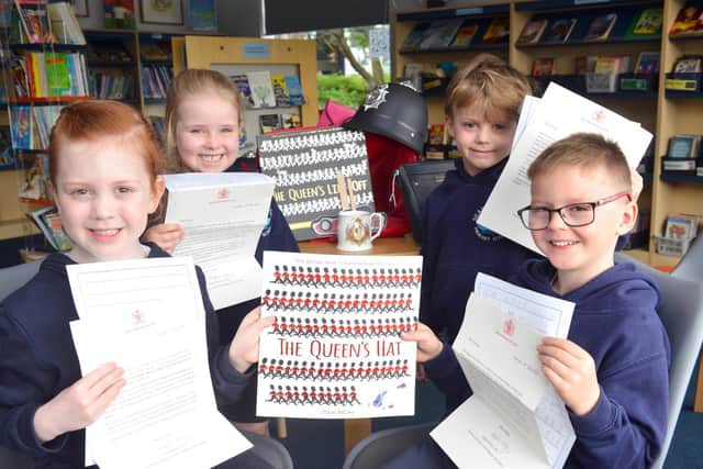 Seaburn Dene Primary School pupils Larnah Osmond, Emily Mews, Arthur Edwards, and Thomas Stidwell, all six, with their letters addressed from the Queen.