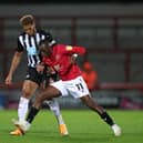 Newcastle United's Brazilian striker Joelinton vies with Morecambe's Senegalese midfielder Carlos Mendes Gomes during the English League Cup third round football match between Morecambe and Newcastle United