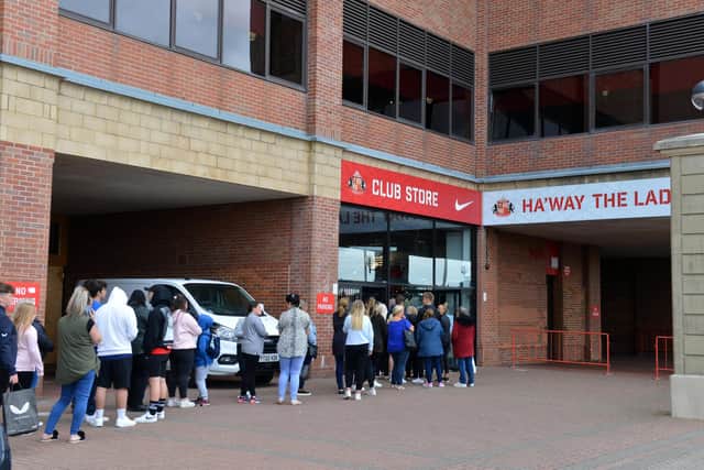 Queuing outside the Stadium of Light club shop.