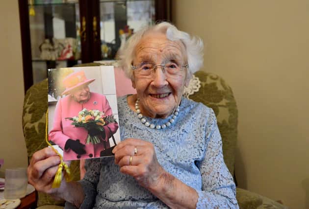 Emma Patterson with her 105th birthday card from The Queen. Picture by Frank Reid