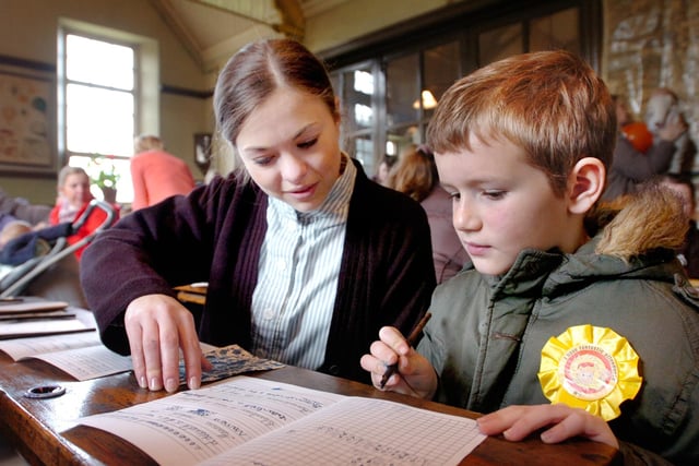 Mitchell Wilson, eight, gets some Victorian-style schooling. He was one of 1,100 school children with perfect attendance rates at Sunderland schools in 2008.