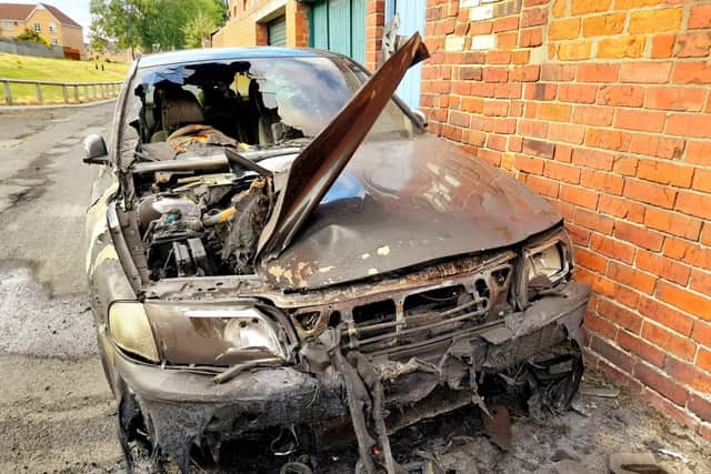 Burnt out car in Ivanhoe Crescent