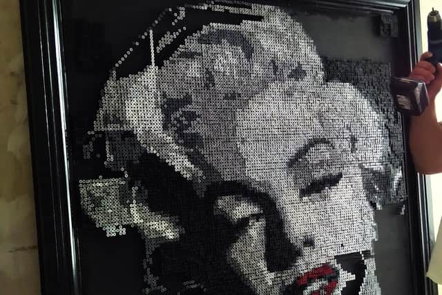 Darren Timby's artwork is made up of more than 26,300 painted screws.