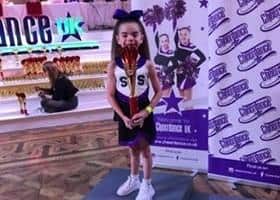 Scarlett with her trophy at the Cheerdance UK competition in Blackpool.