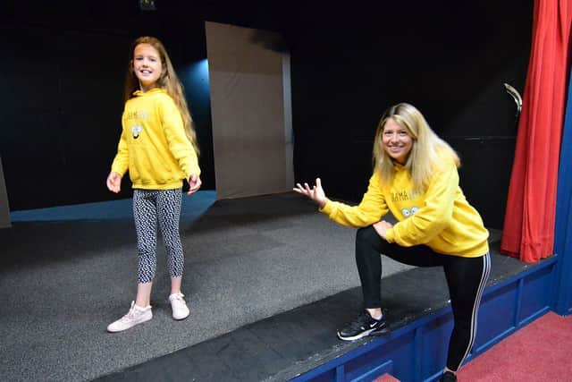 Madeleine Duell (11) on stage  with Charlotte Reid (principle of Drama Geeks) at the Little Theatre, Cleadon.  Picture by FRANK REID.