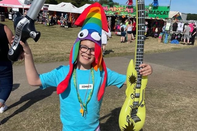 Charlie, age 10, gives us his best inflatable guitar skills. Looking good, Charlie!