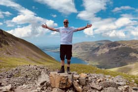 Chris Johnson has completed the three peaks challenge to raise money for Children with Cancer UK.