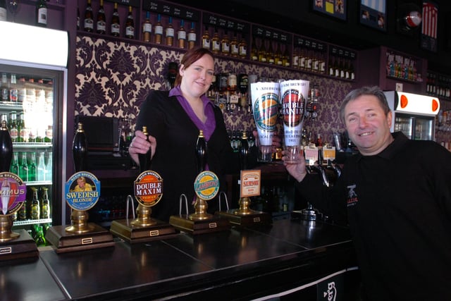 Getting ready for a real ale festival were Kara Langley of The Corner Flag Sports Bar, and Mark Anderson MD of Maxim Brewery in 2012.