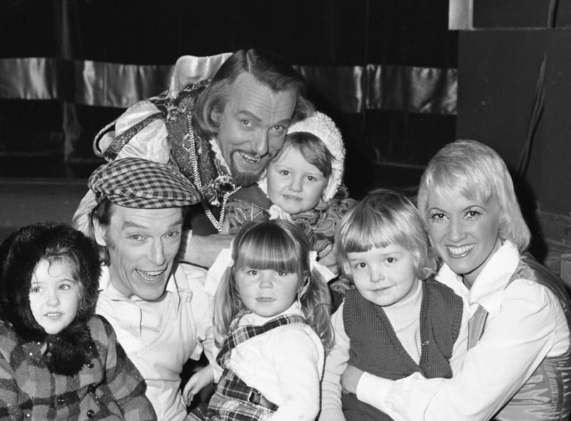 Meeting some of the stars of the Sunderland Empire pantomime in 1974 were  (left to right): James Towning (4) of Carrville, Mandy Ellis (3) of Hylton Castle,  Melanie Parker (2) of Houghton and Lisa Hall (3) of Peterlee.   They are pictured with (left to right) Coro Gurney (Tommy Tucker); Bryan Johnson (Knave of Hearts) and Ken Roberts (Simple Simon).