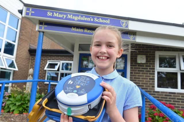 St Mary Magdalen's R C Primary School pupil Claudia Collings, 11 fundraised to get a defibrillator fitted at the school. 
