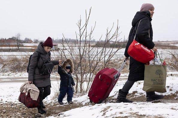 Picture taken near the start of the conflict. Refugees fleeing the war make their way to the Krakovets border crossing with Poland on March 09, 2022 in Krakovets, Ukraine. (Photo by Dan Kitwood/Getty Images) (Photo by Dan Kitwood/Getty Images)
