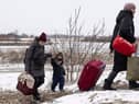 Picture taken near the start of the conflict. Refugees fleeing the war make their way to the Krakovets border crossing with Poland on March 09, 2022 in Krakovets, Ukraine. (Photo by Dan Kitwood/Getty Images) (Photo by Dan Kitwood/Getty Images)