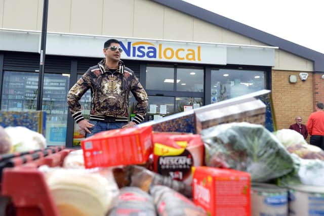 Store owner Bob Singh and his team delivered to 700 houses daily