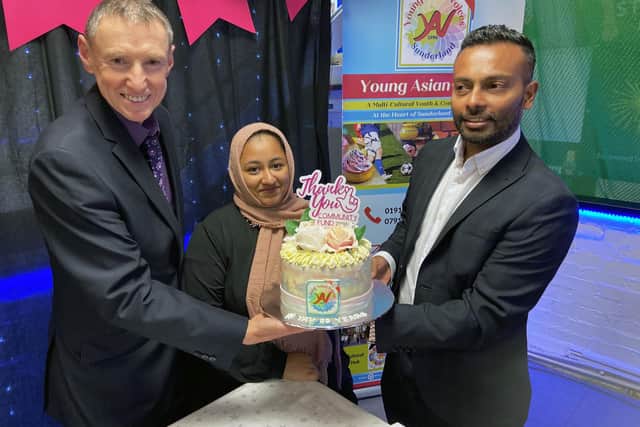 Members (left to right) Dr Paul Andrew, Hamida Begum and Kumareswaradas Ramanathas, of Young Asian Voices celebrate their National Lottery Community Fund grant. Picture by FRANK REID