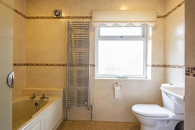 This is one of two bathrooms which include an ensuite shower room.