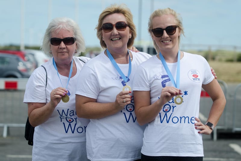 Grandmother, mother and daughter with their medals from the 2016 Walk for Women event in Hartlepool. Pictured are Pauline Wallice, Julie Hackwell, and Ashleigh Hackwell.