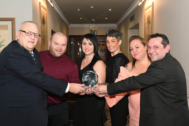 Miles for Men representatives collect the Community Group of the Year trophy at the 2019 Best of Hartlepool Awards.