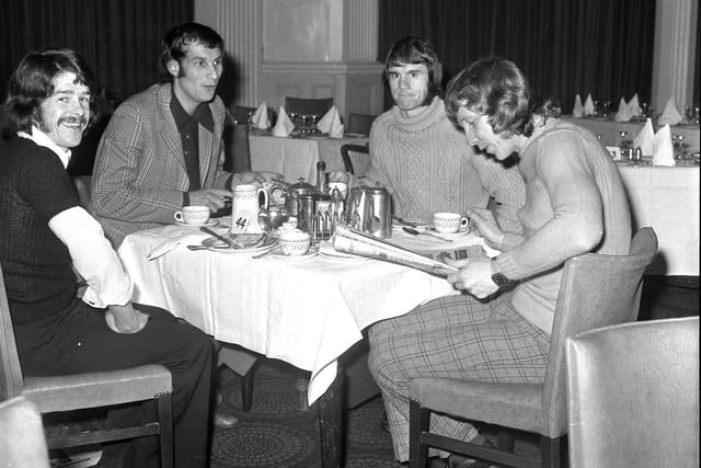 Bobby Kerr, Dick Malone, Dave Watson and Jimmy Montgomery relax at the breakfast table in their hotel.