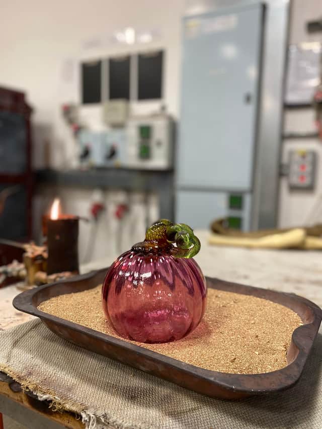 A pink pumpkin ready to go in the lehr oven