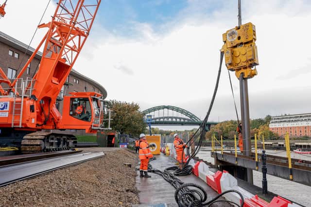 Specialist equipment is being used to drive 100ft piles into the river bed