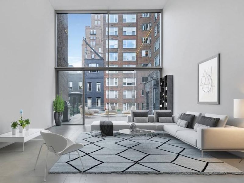 The living room features a 34-feet floor-to-ceiling window that leads to a 600 sq feet terrace.