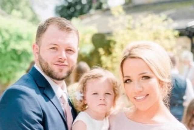 Dan pictured with wife Laura and daughter Poppy