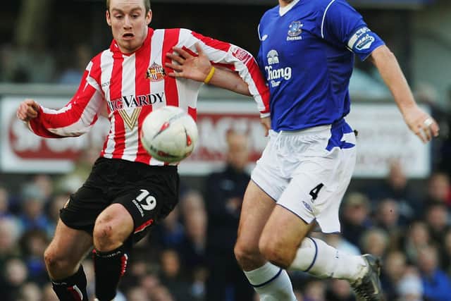 LIVERPOOL, ENGLAND - JANUARY 29: Alan Stubbs of Everton battles for the ball with Stephen Elliott of Sunderland during the FA Cup Fourth Round match between Everton and Sunderland at Goodison Park on January 29, 2005 in Liverpool, England.  (Photo by Laurence Griffiths/Getty Images)