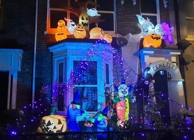Want a closer look at this haunted house? You'll have to make friends with the ghostly gang standing guard outside.