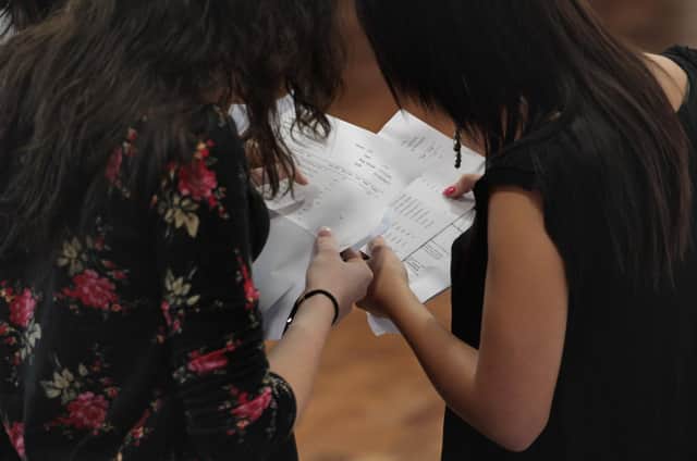 Students opening their A-level results. Photo by Matt Cardy/Getty Images