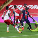 Paris Saint-Germain's Italian forward Moise Kean (C) vies for the ball with Monaco's French midfielder Youssouf Fofana (2L) and Monaco's Italian goalkeeper Vito Mannone (R) during the French L1 football match between Monaco (ASM) and Paris Saint-Germain (PSG) at the Louis II Stadium in Monaco on November 20, 2020. (Photo by Valery HACHE / AFP) (Photo by VALERY HACHE/AFP via Getty Images)