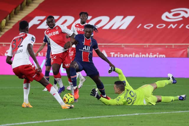 Paris Saint-Germain's Italian forward Moise Kean (C) vies for the ball with Monaco's French midfielder Youssouf Fofana (2L) and Monaco's Italian goalkeeper Vito Mannone (R) during the French L1 football match between Monaco (ASM) and Paris Saint-Germain (PSG) at the Louis II Stadium in Monaco on November 20, 2020. (Photo by Valery HACHE / AFP) (Photo by VALERY HACHE/AFP via Getty Images)