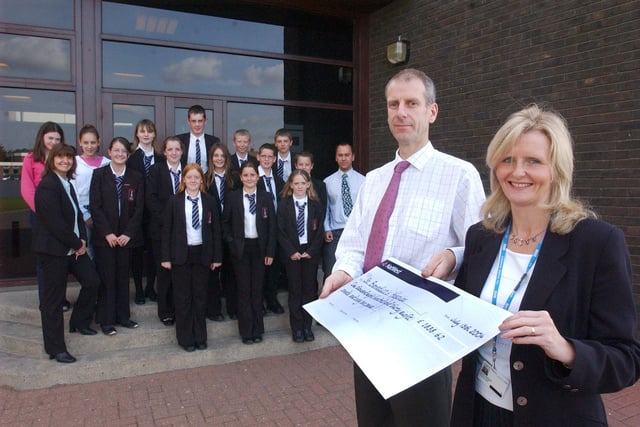 Monkwearmouth School students showed their caring side when they raised money for St Benedict's Hospice 19 years ago. Former pupil Louise Watson returned to the school in her role as a Macmillan Nurse to accept the cheque.
