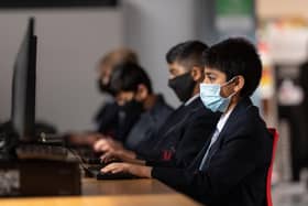Sunderland's Public Health Chief has called on schools to reintroduce additional Covid measures including wearing face coverings indoors. 

 Photo by OLI SCARFF/AFP via Getty Images