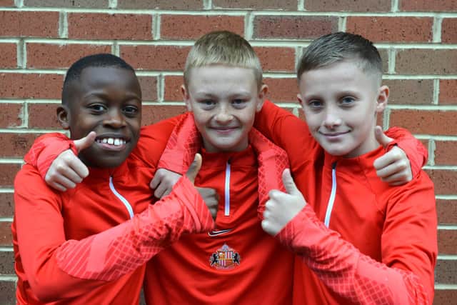 Academy of Light youngsters Chris Chitedze, Michael Howe and Olly New give the thumbs up to their trip to Belgium where they will visit the WW1 battlefields.