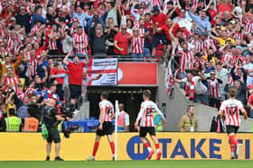Sunderland fans celebrating Ross Stewart's winning goal at Wembley (Photo by Justin Setterfield/Getty Images)