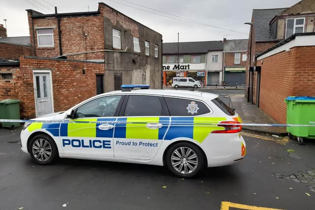 Police cordoned off the Grangetown back lane, now the scene of a murder investigation. Sunderland Echo image.