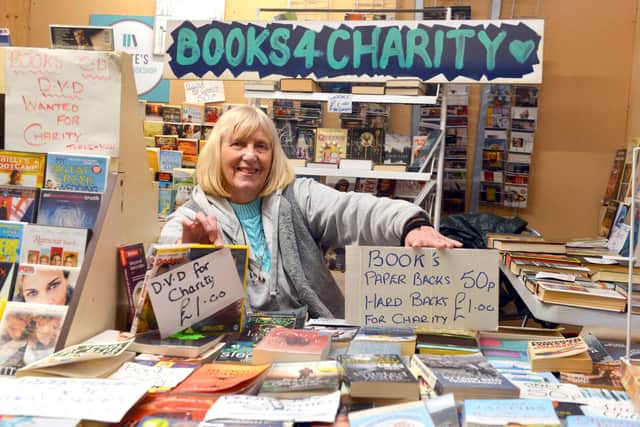 Lilian Griffiths at her Jackie White's Market charity stall.