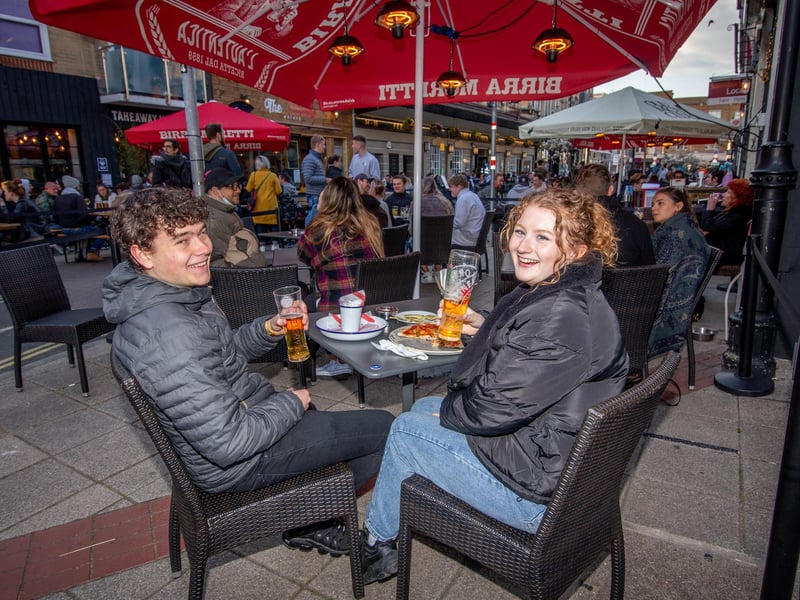 Tom Prior and friend Lizzie enjoying pizza and beer at Southsea Village