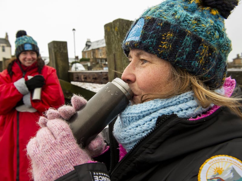Once out of the water, gloves, scarves, dry robes as well as warming drinks are all welcome