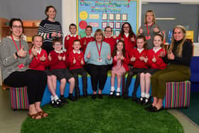 Headteacher Claire McDermott (centre) celebrating the school's good Ofsted judgement with staff and pupils at Farringdon Academy.