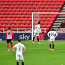 John Marquis scores his second goal from the penalty spot