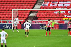 John Marquis scores his second goal from the penalty spot