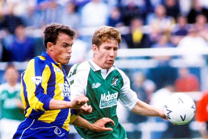 Keith Wright holds off a challenge from Leeds United's David Kerslake dring a pre-season friendly in 1993. Leeds won 2-0.