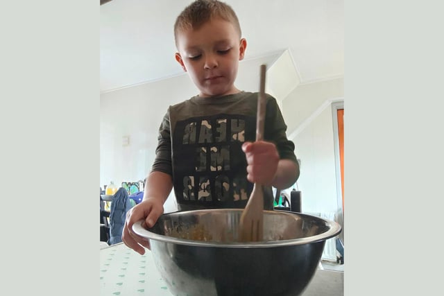 Star baker Jax, age 3, shows us how it's done in the kitchen with his mixing bowl.