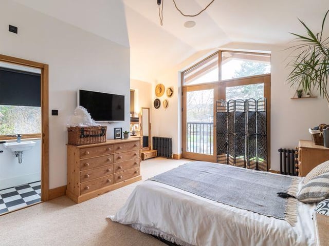 Bedroom one, with its ensuite.