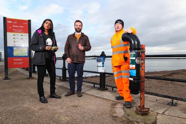 (from left) Vijay Kritzinger of North East Animals Asia; James Simison from Sunderland Marine, and Martin Bell ,of Sunderland City Council, with one of the new bins