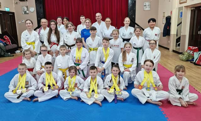 Members of the Dokan Karate Club.