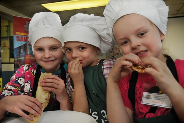 Sara Bramley, Kaitlyn Darcy and Lucy Darcy tucked into pancakes during a safe cooking day at County Durham and Darlington Fire and Rescue HQ at Framwellgate Moor in 2012.