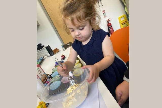Two-year-old Freyah is on hand to help with the baking - and lick the bowl afterwards!